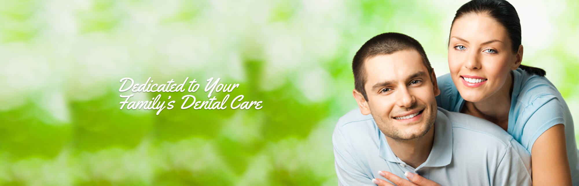 Young smiling couple with a bokah green background